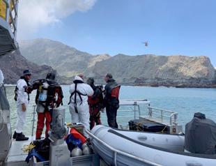 New Zealand divers attempt to recover last 2 volcano victims