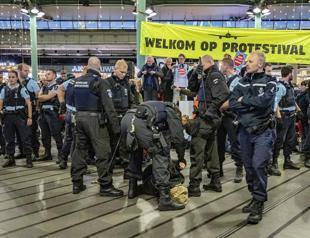 Climate protesters occupy airport in Netherlands
