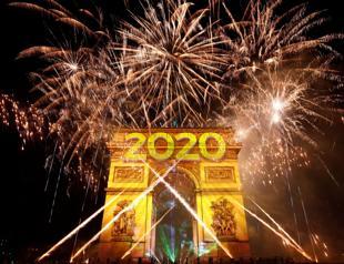 New Year fireworks, smoke and tear gas as decade begins with a bang