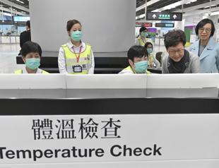 Hong Kong steps up response to mystery disease from China