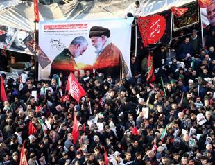 Huge crowds in Iran for commanders funeral, daughter warns US of dark day