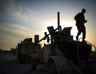 Iraq wants foreign troops out after air strike, Trump threatens sanctions