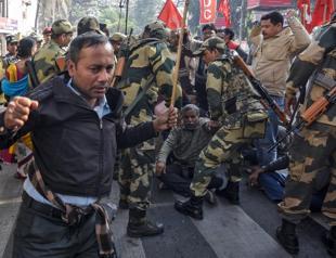 Hundreds of thousands strike in India as slowdown hits jobs