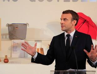 French police evacuate Macron from theatre amid protest