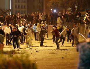 12 injured as protesters, police clash in Lebanon