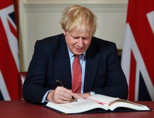 UKs Johnson hails new chapter as he signs EU divorce treaty
