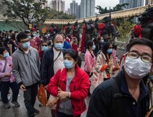 HK leader declares virus emergency, halts official visits to mainland China