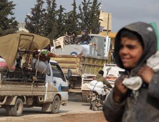 21,000 Idlib civilians flee intensified attacks