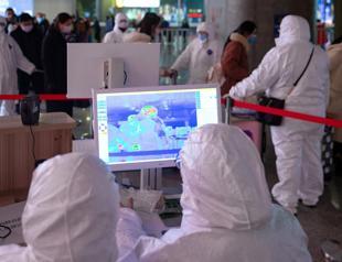 China records first virus death in Beijing as toll passes 100