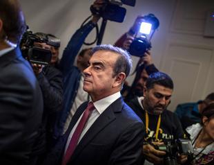 Japan issues warrants for ex-US soldier, two others for Ghosn escape