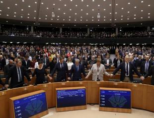 Tears and cheers as EU lawmakers give final nod to Brexit