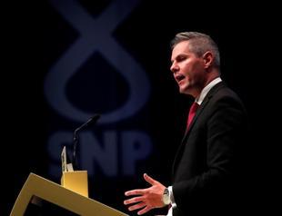 Scottish finance chief quits after report he messaged 16-year-old boy