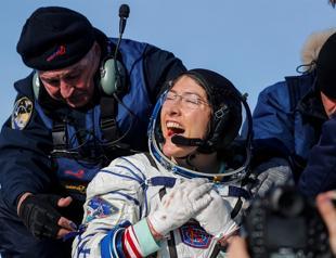 Record-breaking US astronaut returns to Earth
