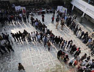 New Delhi votes with Modis popularity on the line