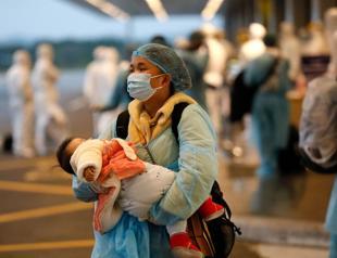 Coronavirus toll hits daily record, exceeds SARS