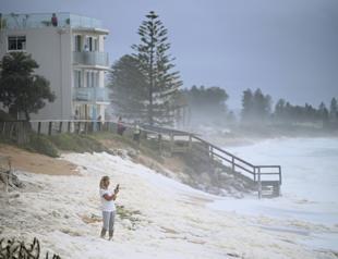 Heavy rains bring both relief and new dangers to bushfire-hit Australia