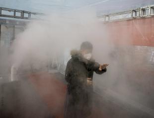 China’s new virus cases fall again, deaths now exceed 1,100