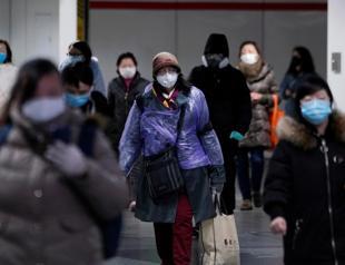 Hundreds of Americans flown home from cruise ship, 14 with coronavirus