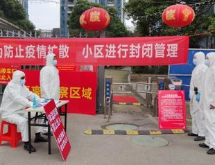 China virus cases drop as foreign fears rise