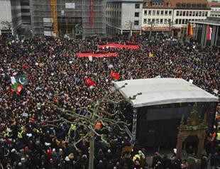 10,000 mourn victims of racist shooting rampage in Germany