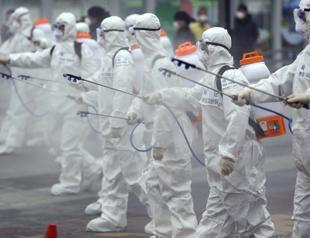 Virus effects take hold as Trump calls criticisms a ‘hoax’