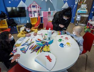 Children battling cancer boost their spirits in hospital’s playrooms