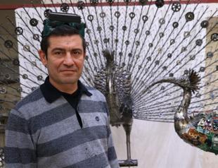 Man creates endangered bird figures out of waste