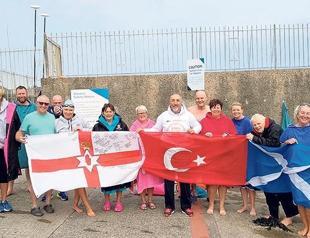 Swimmer crossing the North Channel receives award