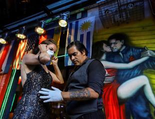 Dancing cheek to cheek Argentine tango faces curbs as coronavirus spreads