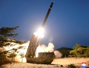 N Korea says it conducted successful test of multiple rocket launchers