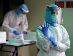 Latest on the coronavirus: Global death toll tops 34,000