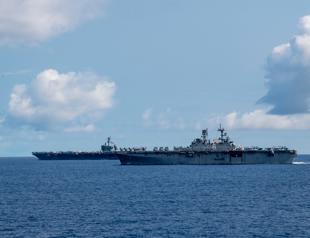 Navy fires captain who sought help for virus-stricken ship