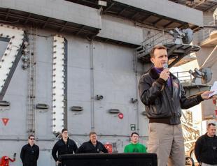 Fired US Navy captain leaves his ship to sailors applause