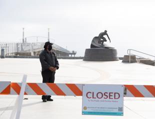 US virus cases hit a million as Germans wear masks in shops