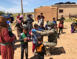 Turkish army distributes aid to 372 children in N Syria