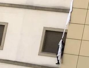 Patient being tested for virus tries to escape from hospital using bedsheets