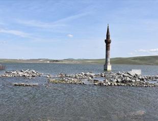 Minaret half-sunken as village submerged by Kars Dam