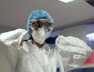 Virus expands grip in many areas, as US nears 100,000 deaths