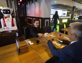 Hello and welcome: robot waiters to the rescue amid virus