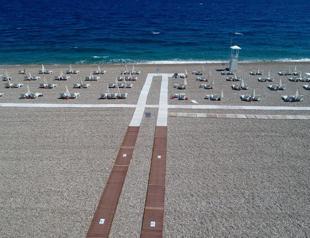 Social distancing areas set up in Antalya beach against virus