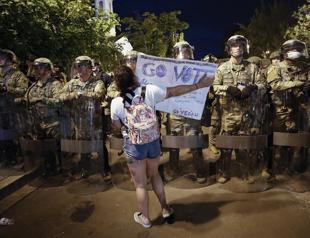 New charges against Minneapolis policemen as protests continue