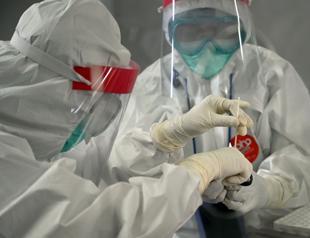 Virus deaths approach 400,000 as oil producers extend output cuts