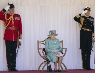 A scaled-down ceremony at Windsor marks Queen Elizabeths official birthday