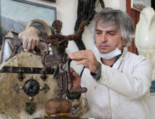 Man turns waste into sculptures of endangered animals