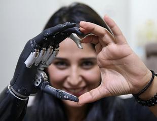 Bionic arm helps guide cling to life