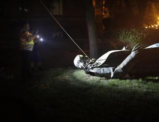 DC protesters pull down, burn statue of Confederate general