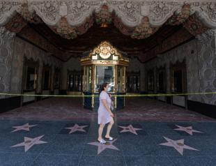 Hollywood poised for big-screen gamble as theaters reopen