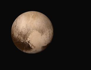 Pluto’s crust may be hiding ocean