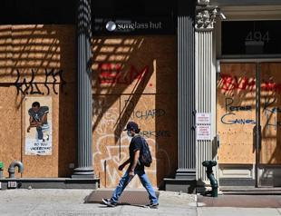 US states reimpose virus measures as cases near record