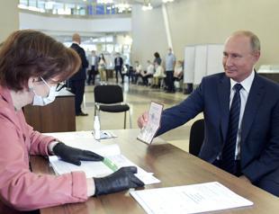 Russians grant Putin right to extend his rule until 2036 in landslide vote